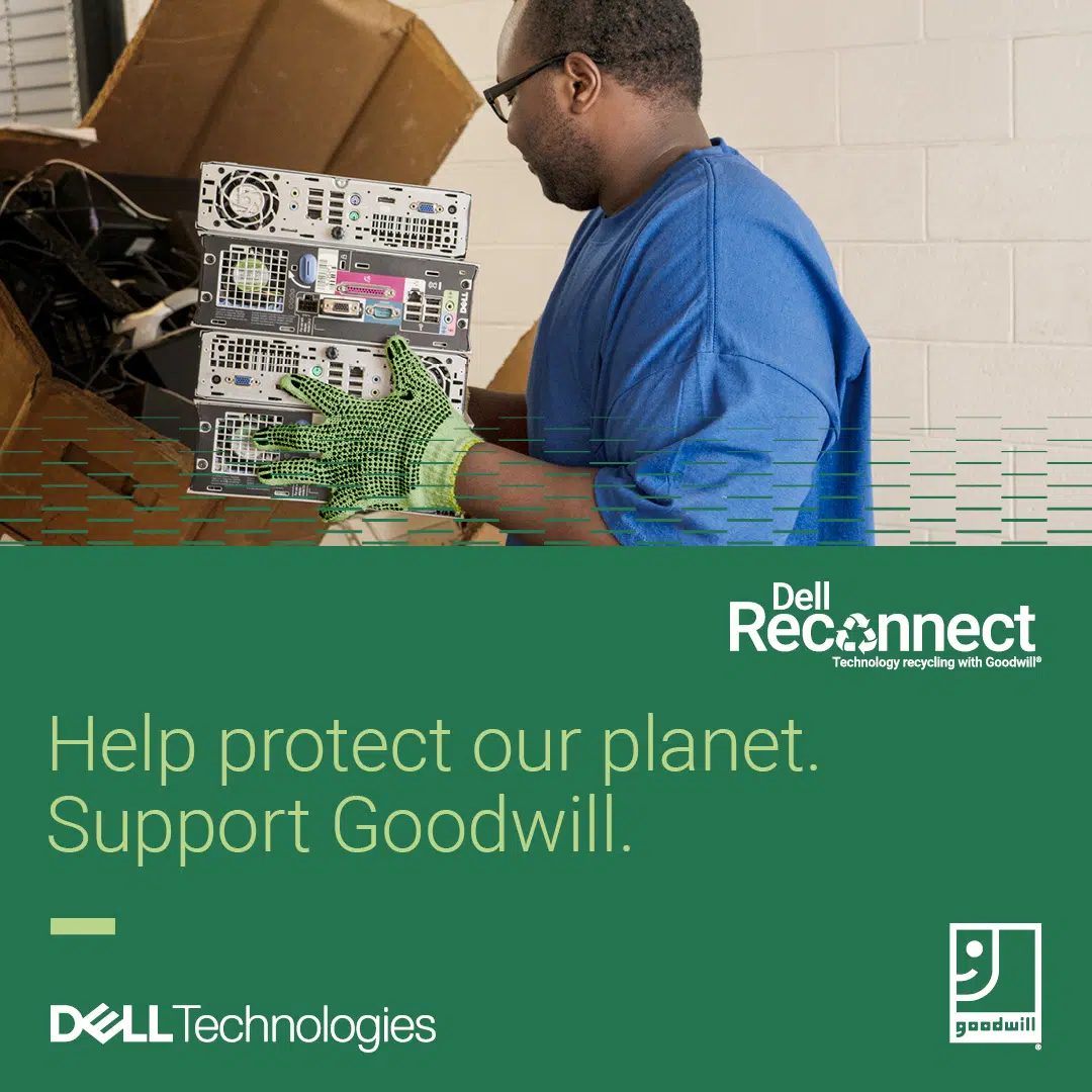 Dell Reconnect Program Man holding old computer to be recycled by Dell Reconnect.