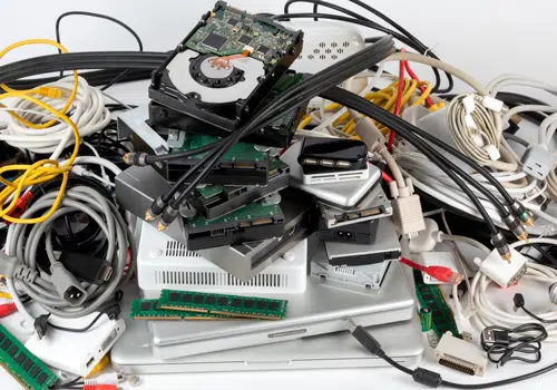 Electronics Recycling Slider Pile of electronics to be recycled.