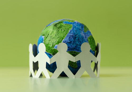 World Earth Day Concept. Green Energy, ESG, Renewable and Sustainable Resources. Environmental Care. Paper Cut as Group of People Embracing a Green Globe. Protecting Planet Together.