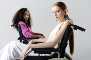 Women sittin in wheelchair looking at camera